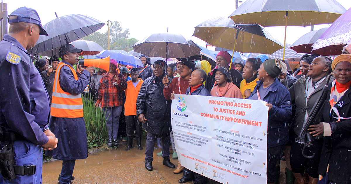 Elim residents march in rain demanding action on violent crime
