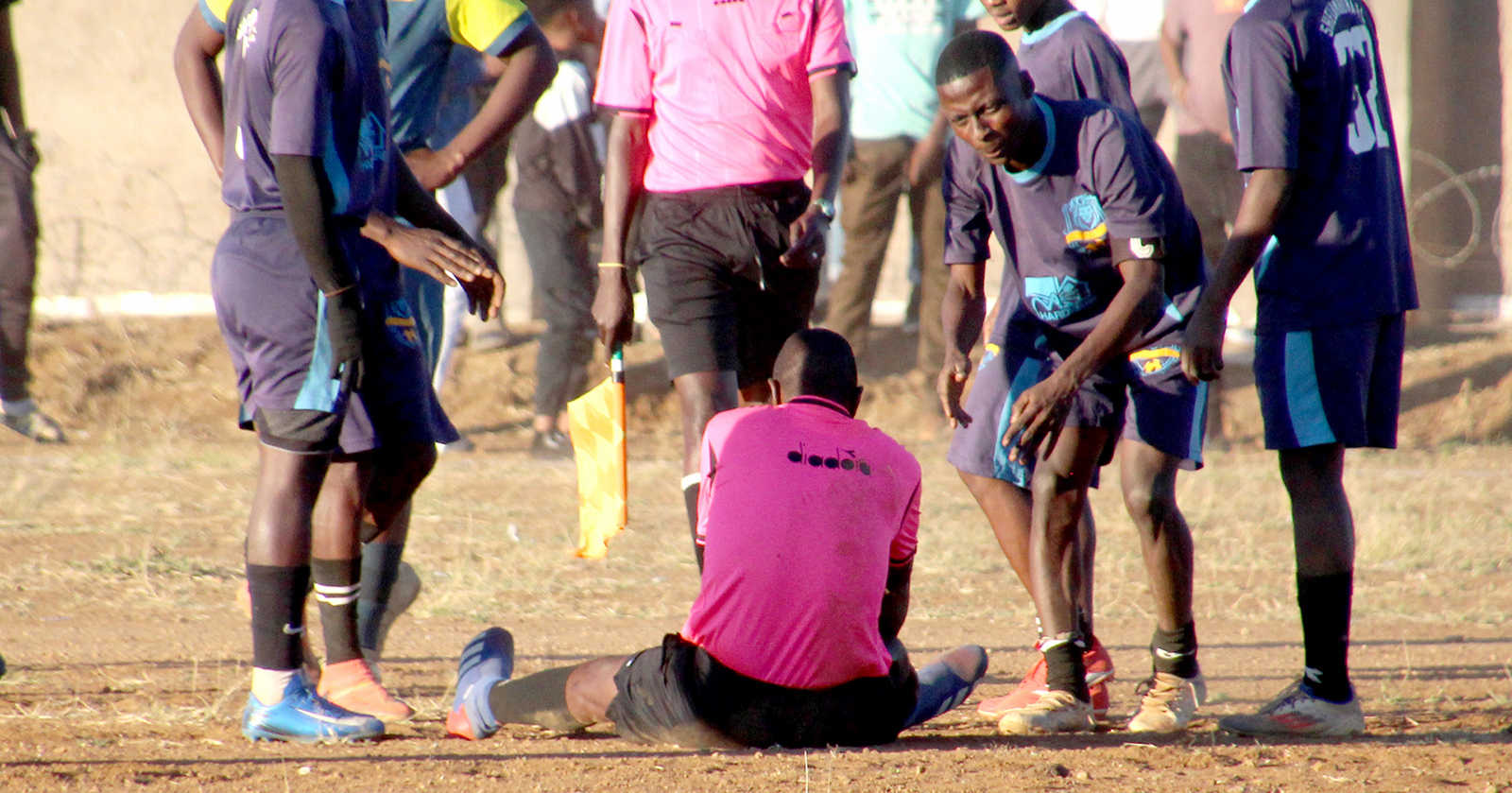League match abandoned after referee collapses on field