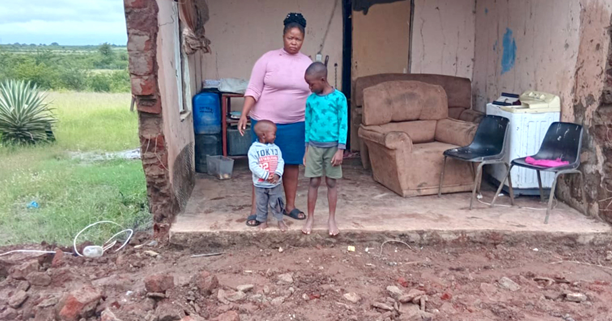 Family exposed to the elements as side wall of house collapses