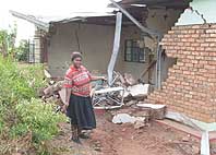 Shock as vehicle crashes into house