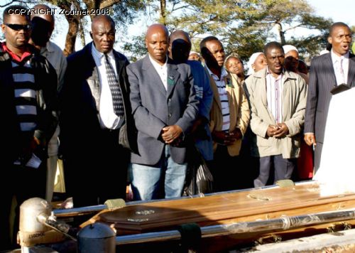 Thousands turn up for taxi driver burial