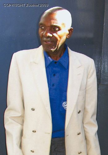 Headman charged with murder