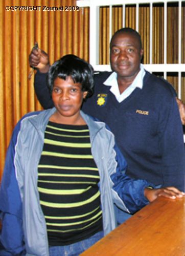 Wife and two hitmen in court