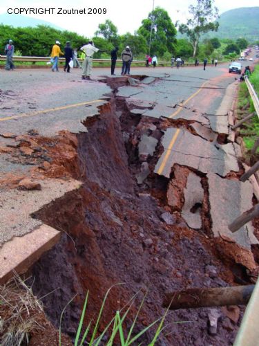 Scores left stranded after road caves in