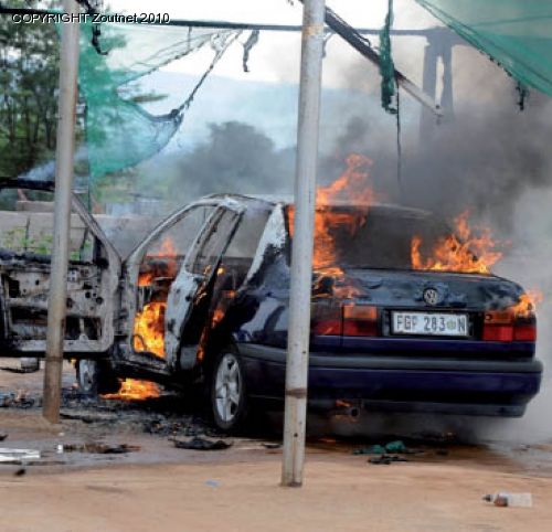 Car burns in washing bay