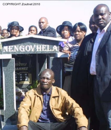 Businessman laid to rest