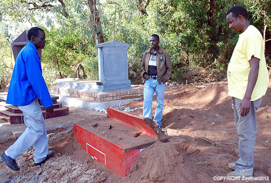 Grief stricken family in shock as fridge gets buried in grave