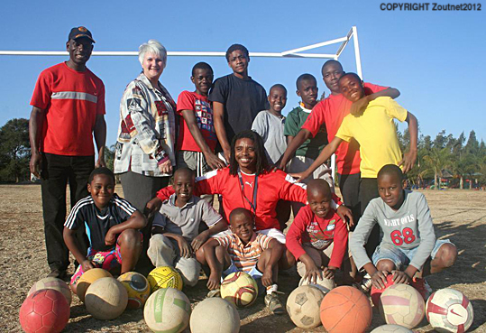 Champions open academy with Vusi