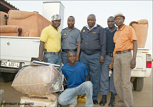 Two arrested after content of house disappears