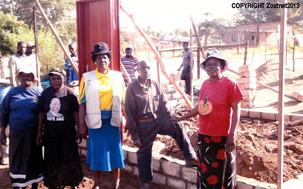 Community builds house for poor man