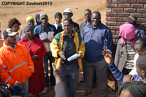 Community workers eventually receive money