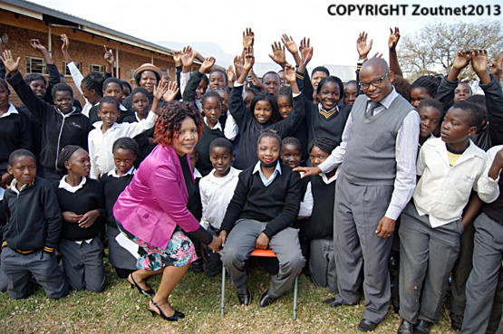 After five months in hospital young fire victim back at school