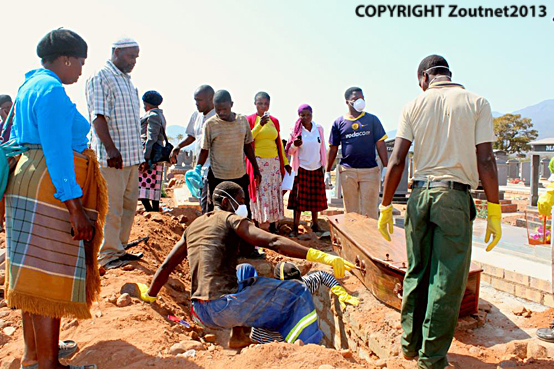After three weeks in unknown grave, gogo is buried at last