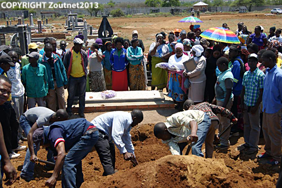 “Hand ritual murder victim” buried after seven month battle