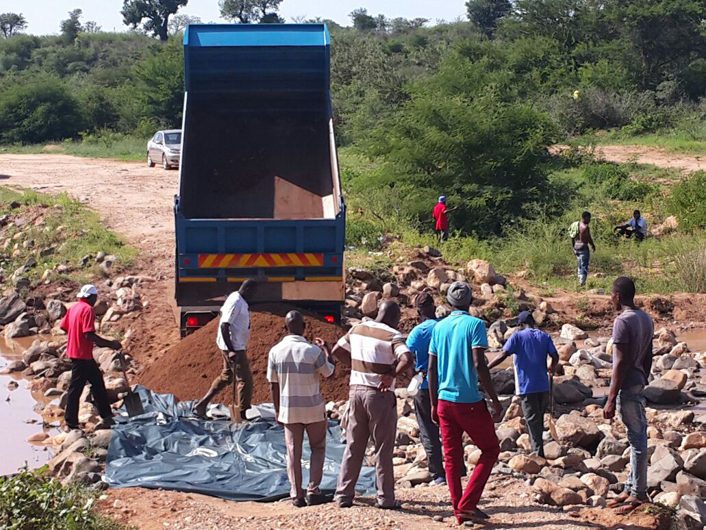 Community members repair Wayeni bridge