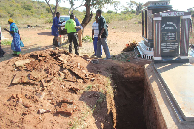 Shock as body without head is dug up at graveyard