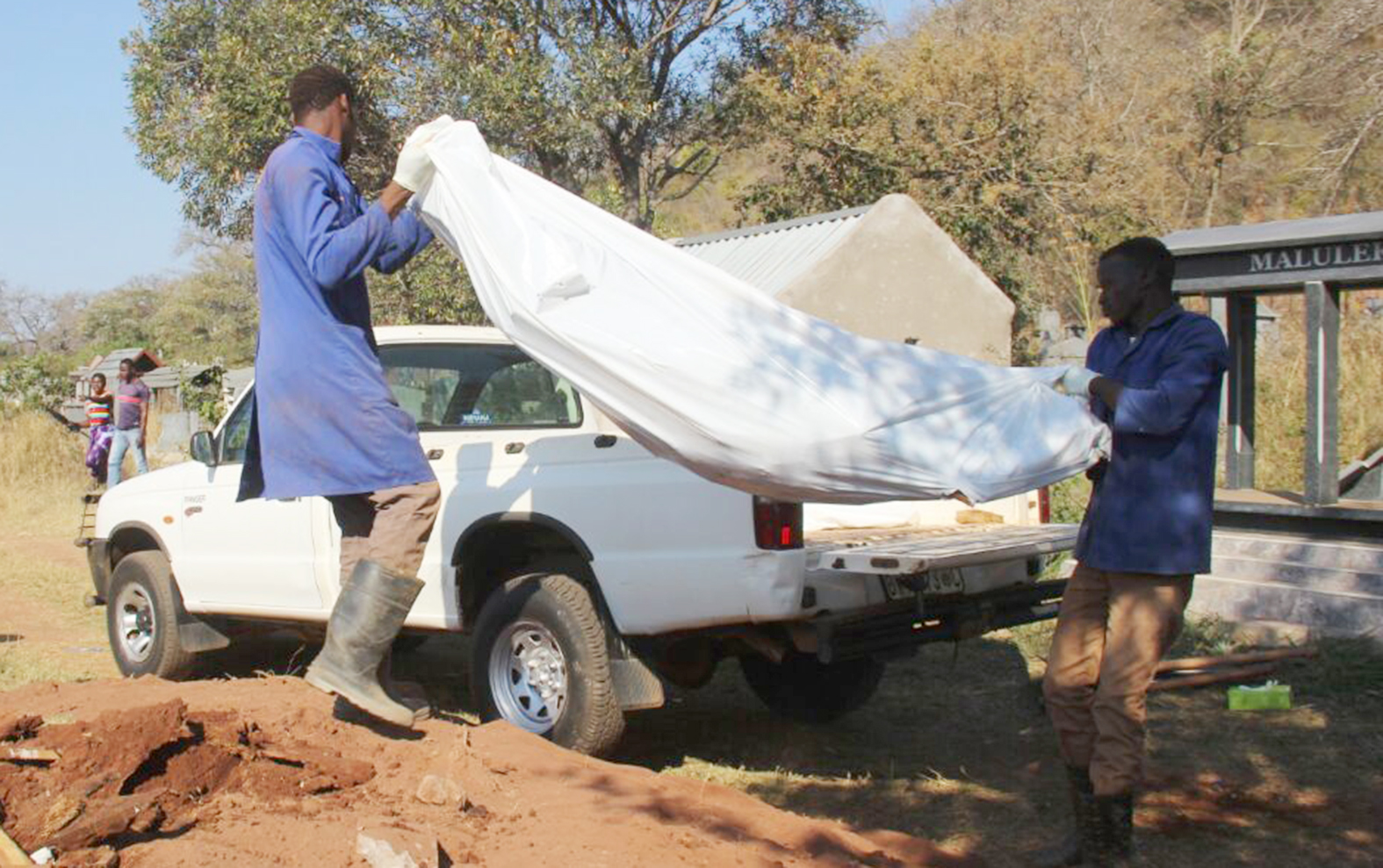 Horror as headless body is exhumed