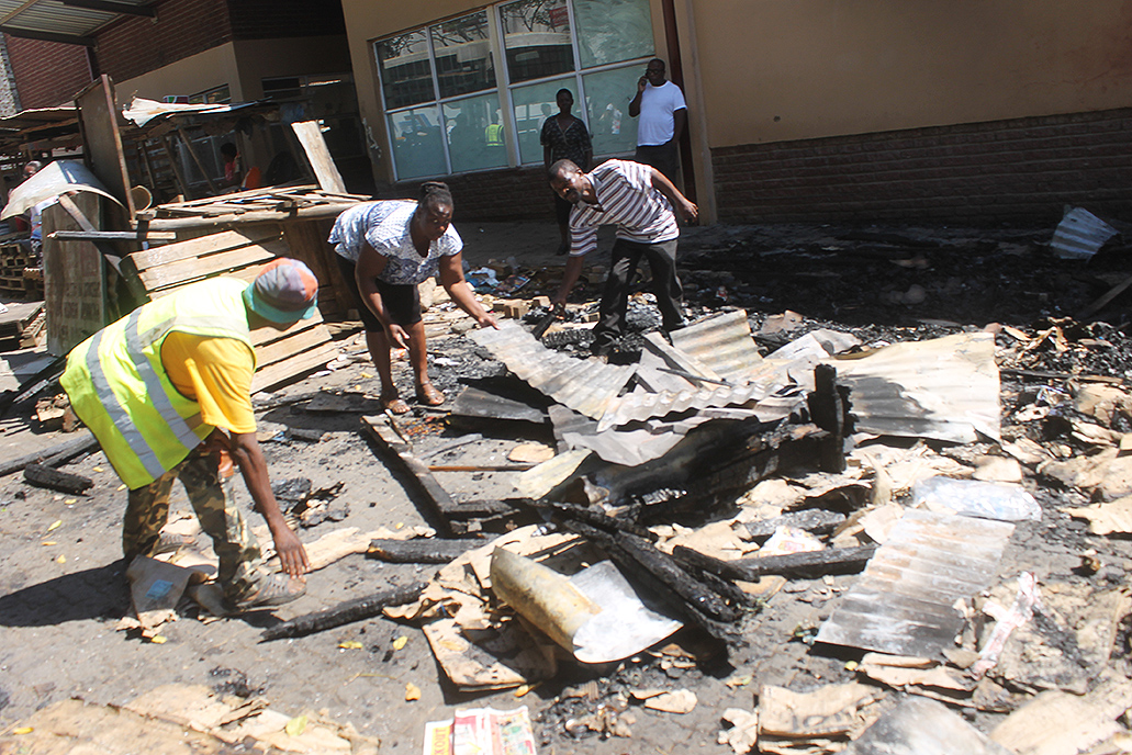 Hawkers' shacks burnt down