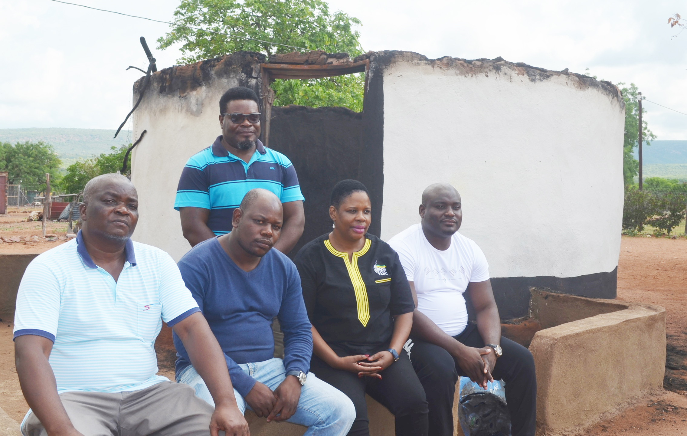 Family in hiding after houses set alight