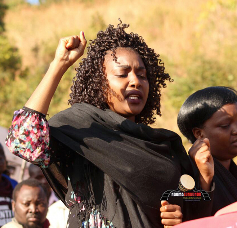 "Stop killing our women and children."