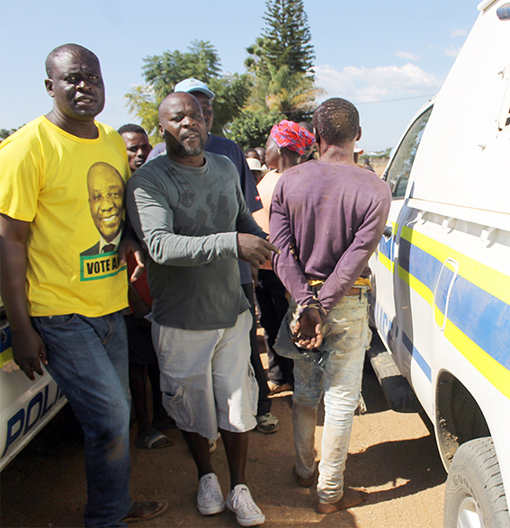 Business robbery suspect rescued by police