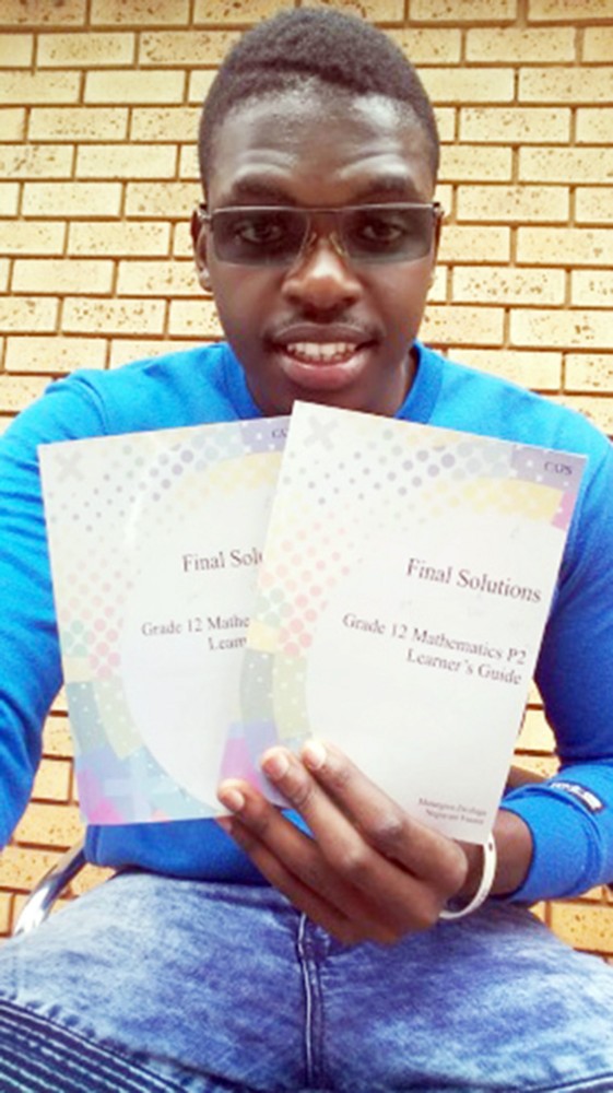 Young student writes Grade 12 mathematics study guide