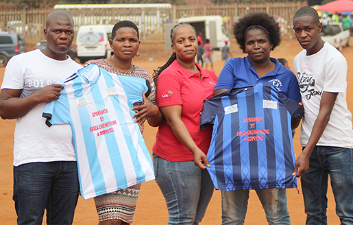 Two gogos teams receive soccer kit