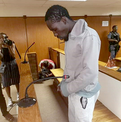 Students bay for suspected killer's blood