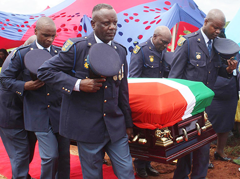 Hardworking cop saluted during his funeral