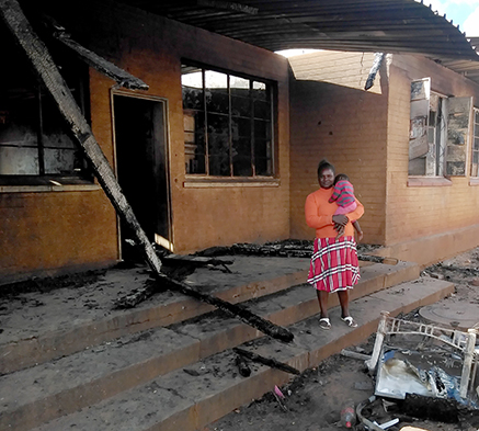 Mom rescues baby from burning building