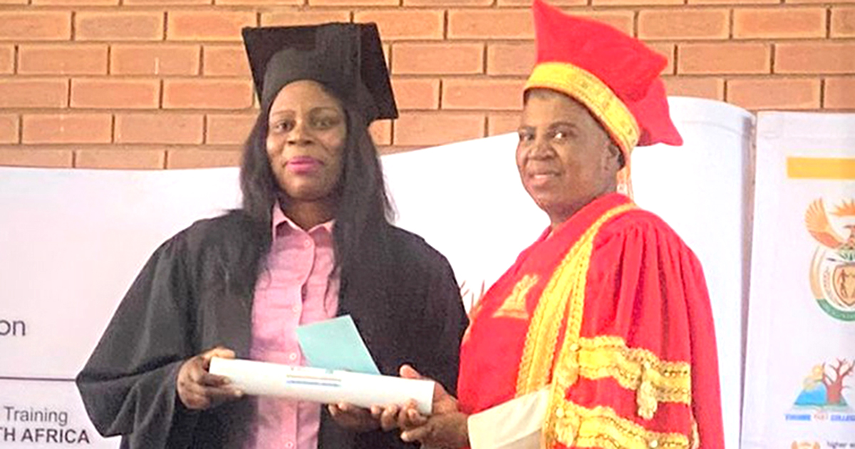 Nemalale swops overalls for a graduation gown