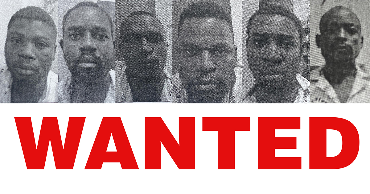 Massive manhunt for heavily armed suspects in escape drama