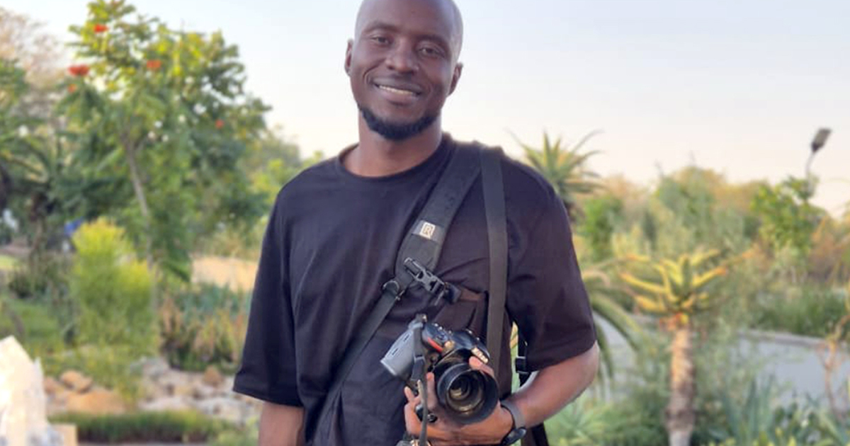 Ritonde uses his digital camera to focus on entrepreneurship