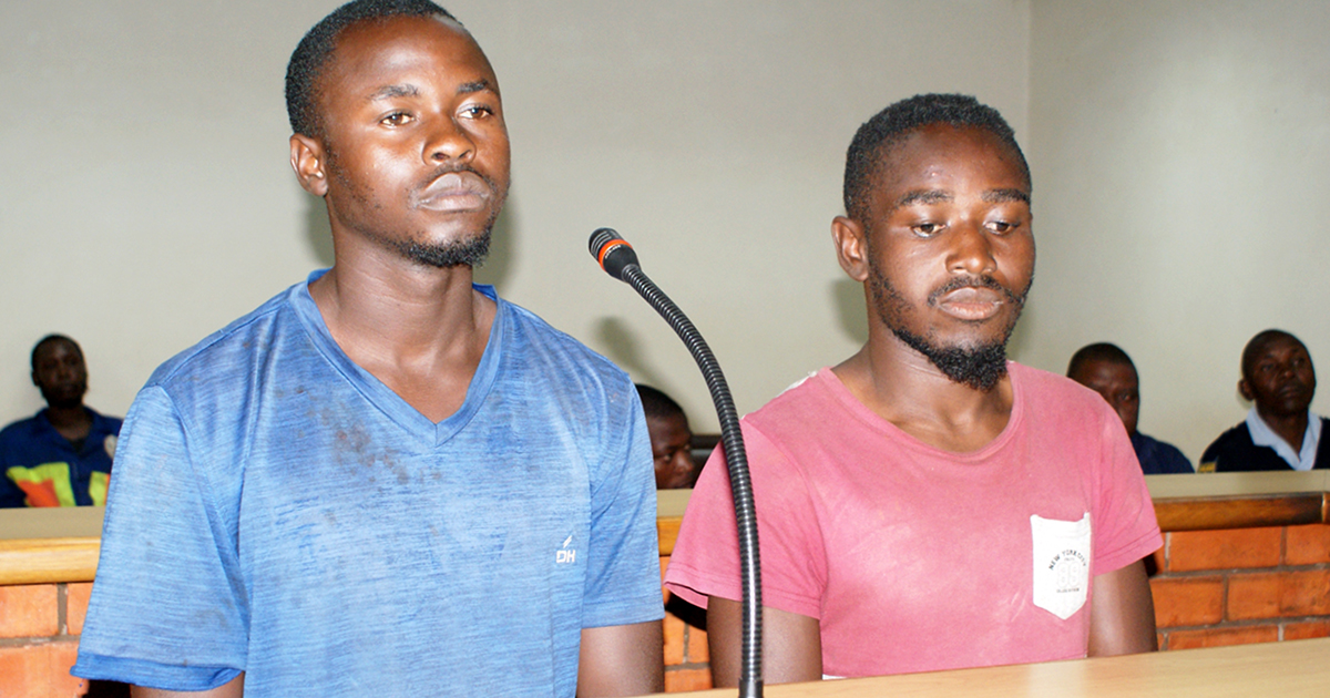 Court is pack as traffic cop's alleged killers make an appearance