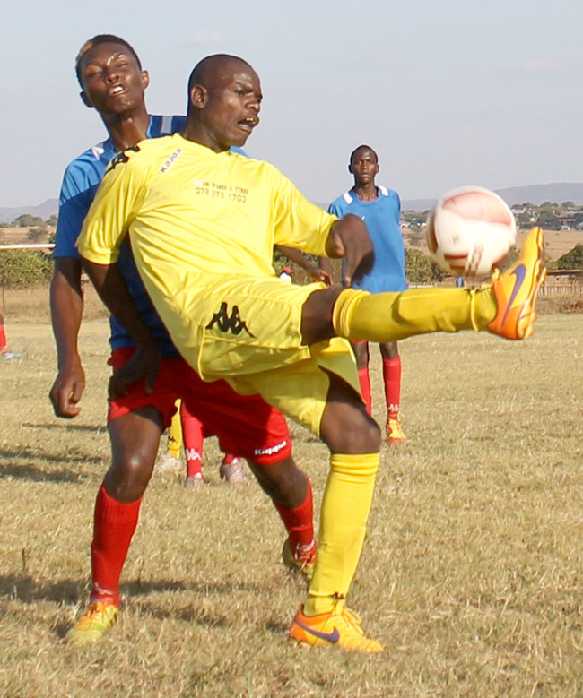Defenders beat Wayeni in play-offs