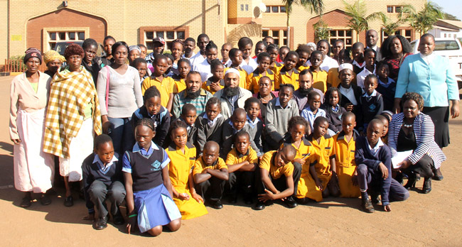Muslim Jamaat donates uniforms to poor pupils