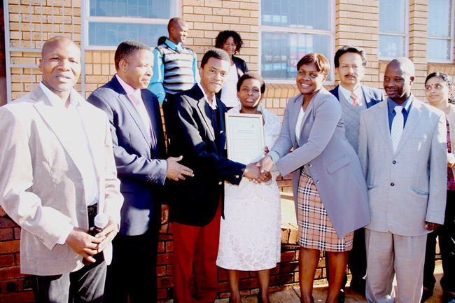 Mbilwi pupil hoists the school’s flag high