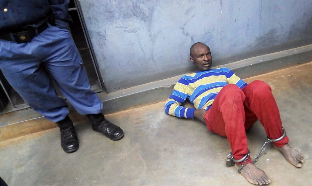 Man accused of cutting wife's head off, appears in court